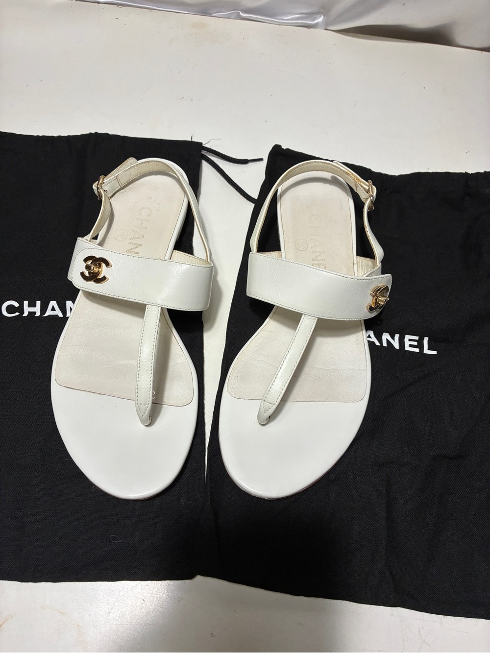 CHANEL White Leather T-Strap Sandals with Gold CC Hardware